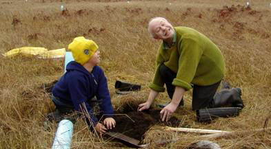 Happy volunteers working on the prairie